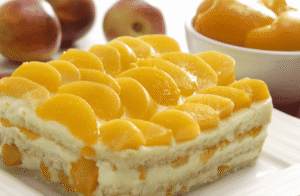 Bolo de Pêssegos em Calda –