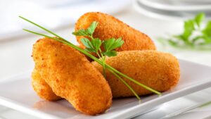 O croquete que faz qualquer mesa virar disputa no garfo