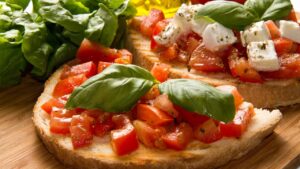 Entrada de restaurante em casa Fiz essa bruschetta de tomate e todos pediram a receita